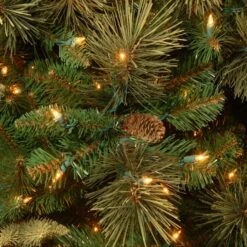 6.5 Ft. Pre-Lit Carolina Pine Slim Artificial Christmas Tree With Flocked Pine Cones, Clear Lights -Northlight Sale Store 28904 CAP3 330 65 2