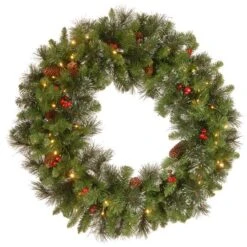 30" Crestwood® Spruce Wreath With Cones, Red Berries, Glitter & 70ct. Warm White Battery Operated LED Lights With Timer