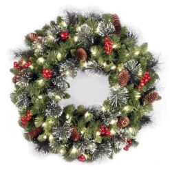 24" Crestwood® Spruce Wreath With Silver Bristle, Pine Cones, Red Berries & Glitter With Warm White LED Lights