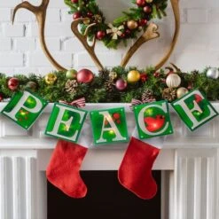 Impact 4.5ft. Shimmering Green Lighted Peace Garland 13 Impact 4.5ft. Shimmering Green Lighted Peace Garland -Northlight Sale Store D491001S 13