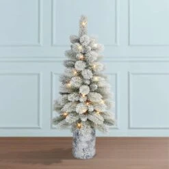 3.5ft. Pre-Lit Potted Flocked Pine Artificial Christmas Tree, White LED Lights -Northlight Sale Store D659724S 3