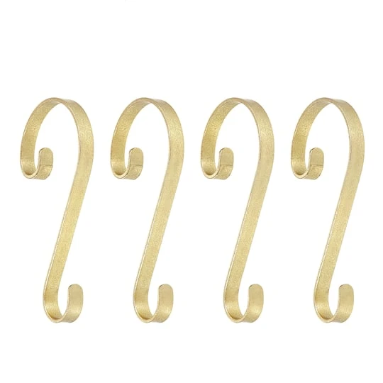 Haute Decor Stocking Scrolls® Glimmer Gold Stocking Holders, 4ct. 1 Haute Decor Stocking Scrolls® Glimmer Gold Stocking Holders, 4ct.