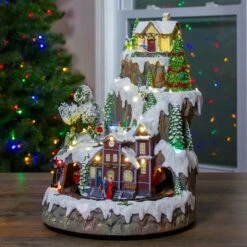 Northlight 17" White LED Lighted & Animated Christmas Village With Moving Train -Northlight Sale Store D676293S 2